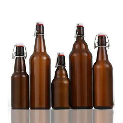 China Wholesale Clear Amber Empty Crafts Beer Bottles Beverage 330ml 12oz Glass Beer Bottle With Swing Top With Boxes for sale