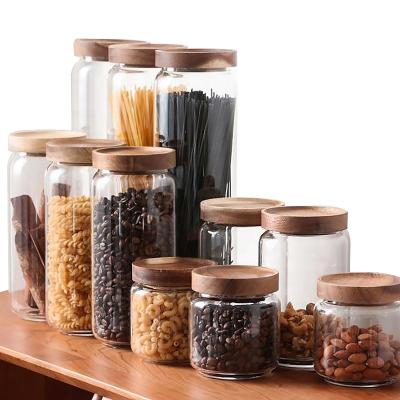 China Single Round Clear Glass Food Storage Container with Airtight Wooden Lid for Candy, Cookie, Rice, Sugar, Flour, Nuts for sale