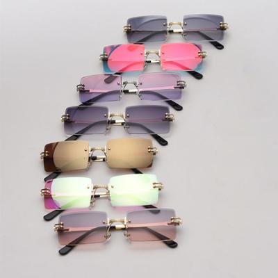 China Rimless Eyewear Fishing Over The Top Fashion Sunglasses U Frame Sunwear Men Women Metal Wholesale Sunglasses for sale