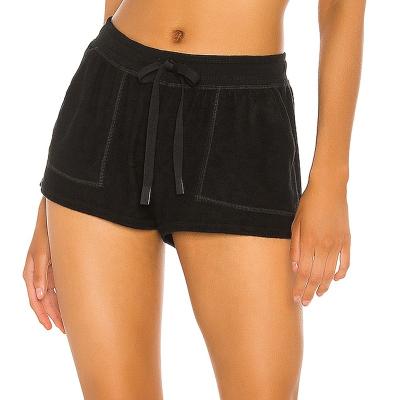 China New Breathable Black Fitness Pouch Sweat Sports Mid-Rise Waisted Gym Shorts Women for sale