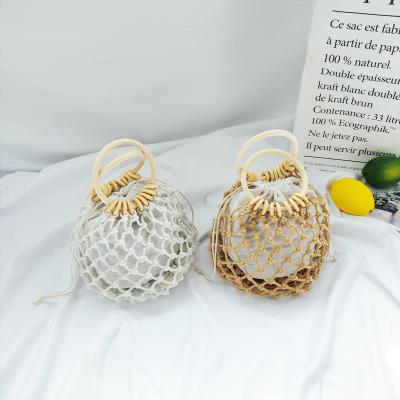 China Fashion Handmade Crochet Net Bag Women Soft Straw Woven Cotton Beach Bag With Hard Handle Clutch Handbags for sale