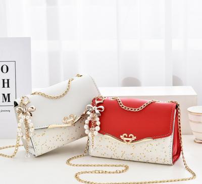 China Fashion Brand Designer Fashion Strap Bags Bowknot-Decoration Confetti Soft Gold Chain Cross - Body Bag For Women for sale