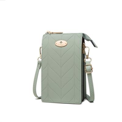 China PRETTYZYS 2021 Fashion New Arrival Oval Metal Leaves Pattern Mini Logo Mobile Phone Bag Touch Screen Mobile Phone Bag for sale