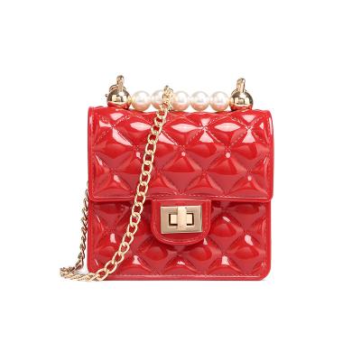 China Newest Fashinable 2021 New Arrivals Fashion PVC Body Bag Cross Purses Small Freeze Pearl Child Handbags for sale