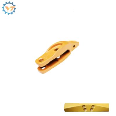 China Yellow Color Bucket Teeth Adapter Ground Engaging Tool for Heavy Machinery Spare Parts for sale