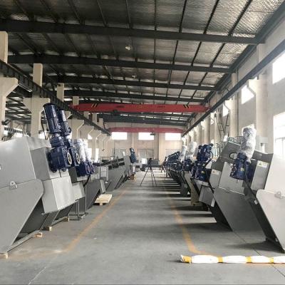 China Home Sewage Treatment Plant Small Stainless Steel Screw Sludge Dewatering Filter Press Equipment High Efficiency for sale