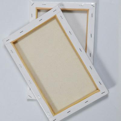 China Painting Canvas Art for Art Paint Studio High Quality Stretched Cotton Canvas Blank White Painting OEM Frame Toxic Tape Surface for sale