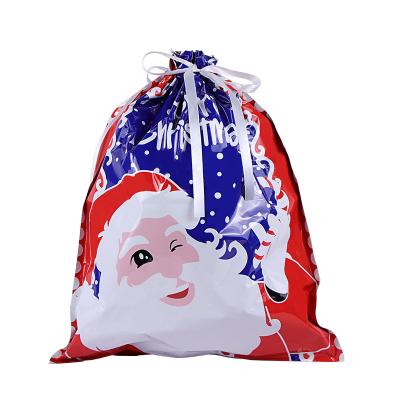 China Recyclable Custom Plastic Drawstring Gift Wrapping Bags With Logo Printing Christmas Gift Bag For Christmas Party for sale