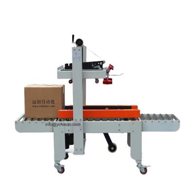 China CLOTHING Semi Automatic Top Side 220 W Heavy Duty Belt Driven Adhesive Tape Carton Sealer For Factory Line for sale