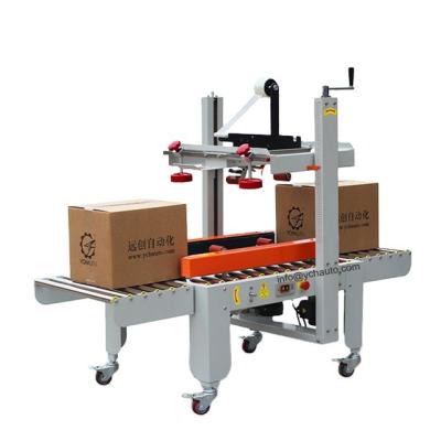 China Carton Case Carton Case Belt Driven Belt Delivery Machinery Semi Automatic CLOTHING Strip Box Side Sealer for sale