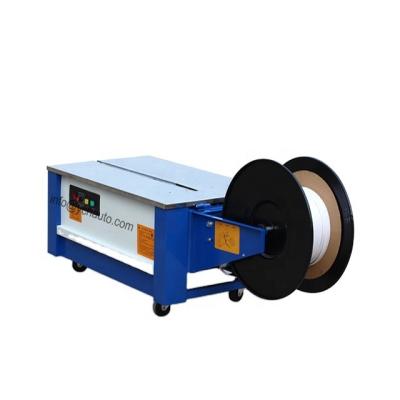 China CLOTHING low table pp band semi-automatic carton tying machine for sale