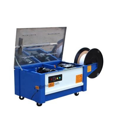 China CLOTHING low table pp band semi automatic strapping machine for carton for sale