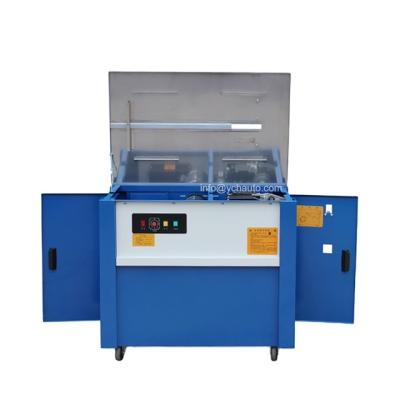 China Semi Automatic CLOTHING Belt Carton Tying Band Machine for sale