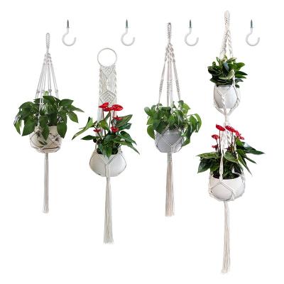 China Minimalist Different Handmade Designs Cotton Rope Macrame Wall Hanging Christmas Planter Holders for Garden Balcony Patio Decor for sale