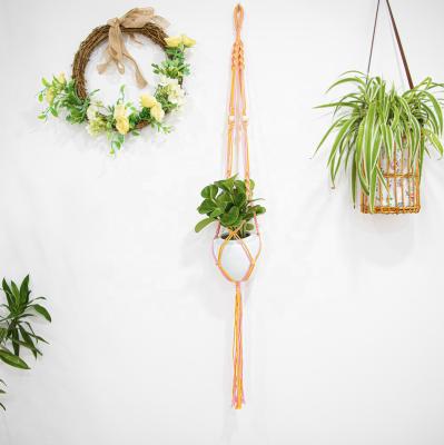 China 100% New 2022 Handmade Macrame Indoor Pant Hangers With Wood Beads Plant Hangers Cotton Woven Flower Planter Outdoor Pot Holder for sale