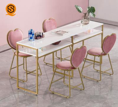 China Joint Cheap Nail Bar Counter Nail Table Chair Pink Nail Joint Seamless Cheap Table for sale