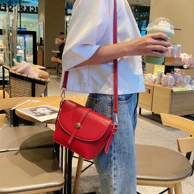 China Cross - body \ shoulder bag \ 2021 Classic Lychee Pattern Diagonal Saddle Bag Simple Women Portable Leather Shoulder Bag Handbags for sale