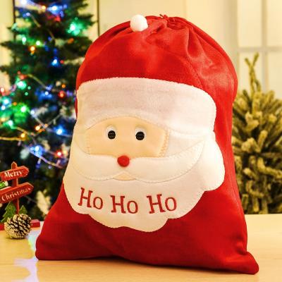 China Santa Claus Pattern Storage Bag Drawstring Non-woven Embroidered Christmas Gift Bag Christmas Ornament Christmas Gift Bag for sale