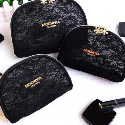 China Makeup Pattern Lace Zipper Fashion Classic Snowflake Handbag Semicircular Clear Luxury Handbag Beautiful Handbag for sale