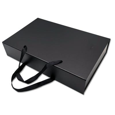 China Customized Large Recyclable Magnetic Folding Cardboard Storage Gift Box With Ribbon for sale