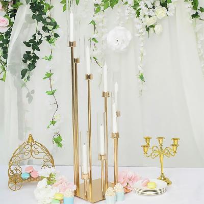 China Nordic Simple Glass Candelabra Luxury Wedding Metal Candlestick Wedding Centerpiece 8 Arms Wedding Table Candle Holder for sale