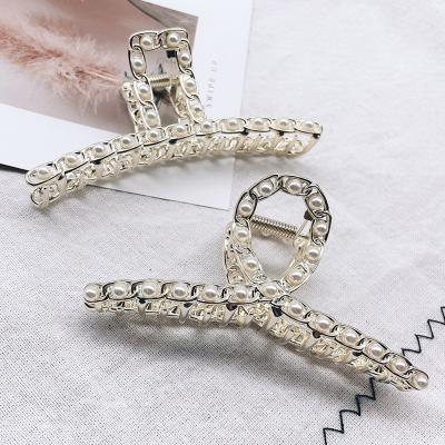 China Fashion Amazon Pearl Hair Claw Clips Large For Hair Fashion Metal Thick Hair Clips For Women Girls Single Banana Hair Clips for sale