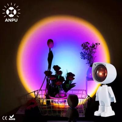 China Creative Atmosphere Mini Lamp Projector Light Modern ANPU Robot Rainbow Sunset Projector Light Led Lamp for sale