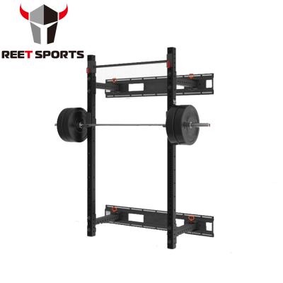 China Commercial gym and fitness home training floding wall mount squat rack for sale