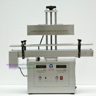 China Food table top automatic bottle sealing equipment for sale