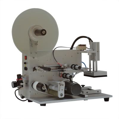 China CLOTHING Manual Top Labeling Machine for sale