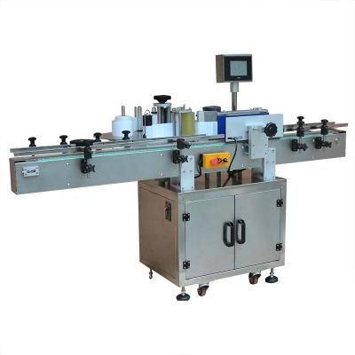 China OPLM-AR GARMENT Automatic Vertical Round Bottle Labeling Machine for sale