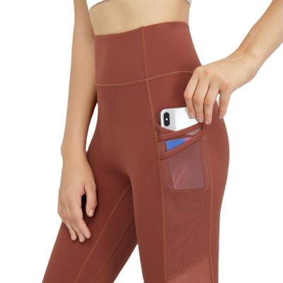 China Fashion Breathable Side Pocket Nude Yoga Pants Since Elastic Waist Move Crop Sexy Ladies Workout Gaiters for sale