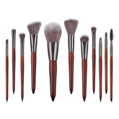 China Angular Blush Makeup Tools New 11 Handle Makeup Brush Mahogany Full Set For Beginners for sale