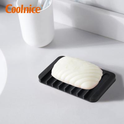 China Self-Draining Modern Waterfall Anti-Slip Design No Water Buildup Gently Keep Dry Silicone Soap Holder Dish Saver for sale