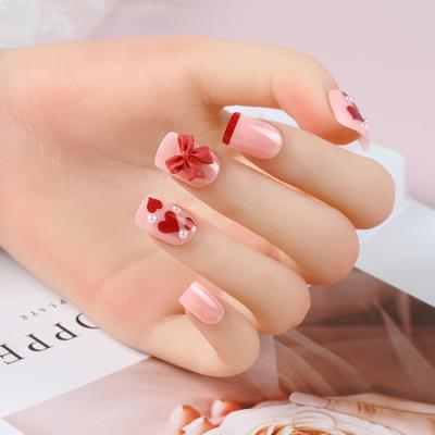 China Easy Apply NEWAIR Wholesale Price Press On Nail Tip Super Cute Bowknot Heart Pearl Artificial False Nail For Lady for sale