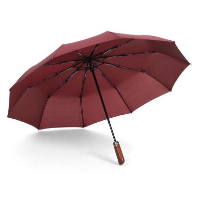 China High Quality Minimalist Compact Wooden Handle Travel Fold Umbrella for sale