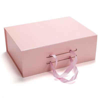 China Recycled Materials Custom Coated Ransperant Foldable Gift Box Paper Packaging With Satin Ribbon for sale