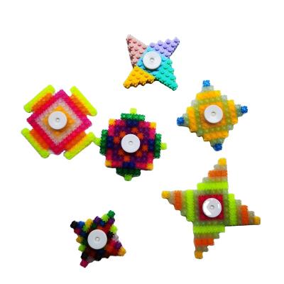 China Building Toy Functional Developmental Creative DIY Deforme Luminous Block Spinner Tool For Blocks for sale