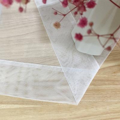 China Modern Cheap White Mesh Voile Tulle Plain Net 100% Polyester Net Curtain Roll Up Sheer Fabric Designs for sale