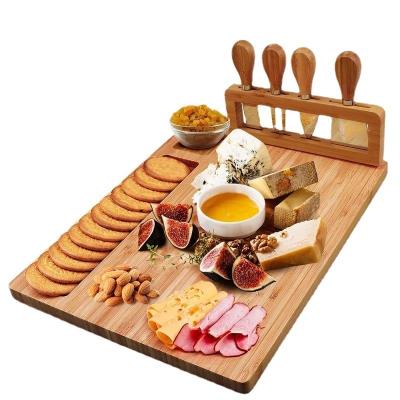 China Sustainable Hot Sale Cutting Board Set Bamboo Cheese Board Tool And Knife Set for sale