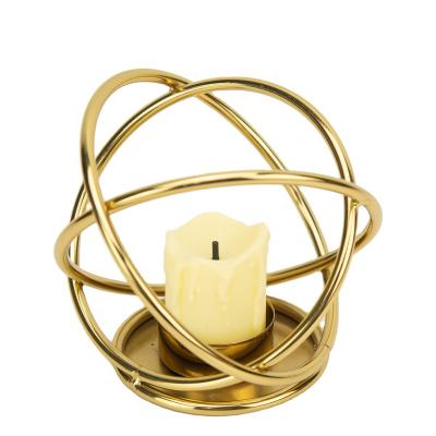 China Iron Art Metal Creative Design Living Room Decor Contemporary Light Luxury Gold Candle Holder for sale