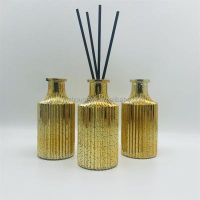 China Gift & Decorative craft YZ-7013# 200ml GOLD plated essential oil reed aroma diffuser glass bottles for indoor uses for sale