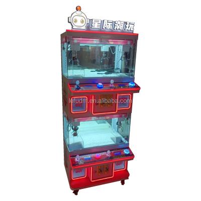 China Attractive appearance mini claw machine toy for kids 4 players claw machine mini small for sale