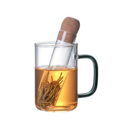 China WITH Transparent Infuser Glass Filter LID Tea Pipe Cork Strainer Design For Cup Fancy Filter Herb for sale