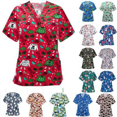 China Breathable Hospita Scrubs Christmas Nurses Printed Christmas Scrub Tops Short Sleeve Medical Scrubs Sets Nurse Hospital Uniform for sale