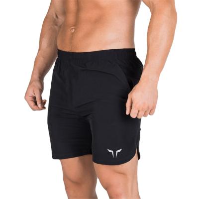 China Breathable Running Sports Fitness Training Quick Drying Shorts 2 In 1 Five Point Pants Men Beach Pants Wholesale for sale