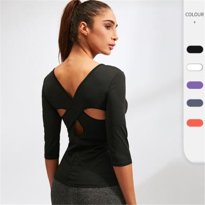 China Breathable Women Yoga Wear, Fitness, Running Sports Dance Tight-fitting, Quick Drying Top Cross Sleeves for sale