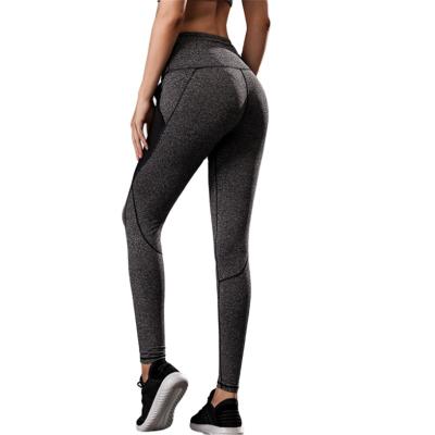 China Ladies Fitness Breathable Mesh Pockets Yoga Running Training Pants High Stretch Sports Quick Dry Pants for sale