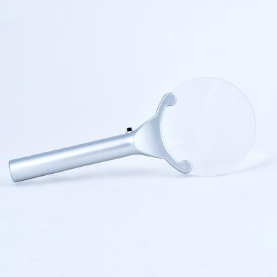 Cina New PMMA Lens Borderless Handheld 5X Magnifier With LED Light Suitable For Elderly Reading in vendita