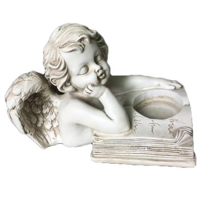 China Pottery Angel Candlestick Decorations Europe Resin Candle Holder Desktop Ornament for sale